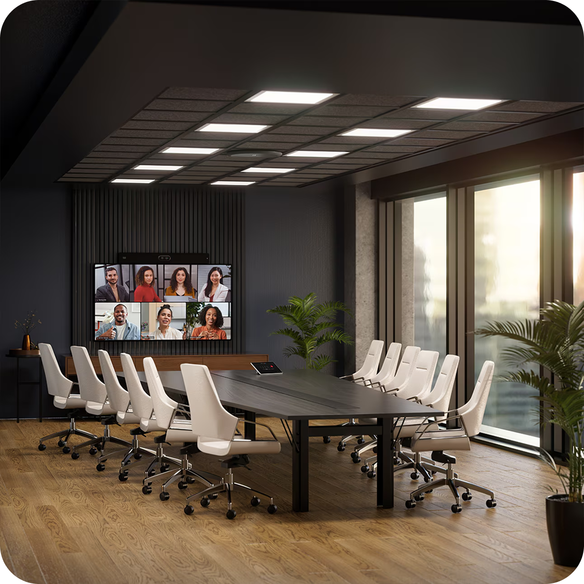 Конференц-зал со столом и стульями перед большим экраном, на котором отображается текущее совещание Webex.